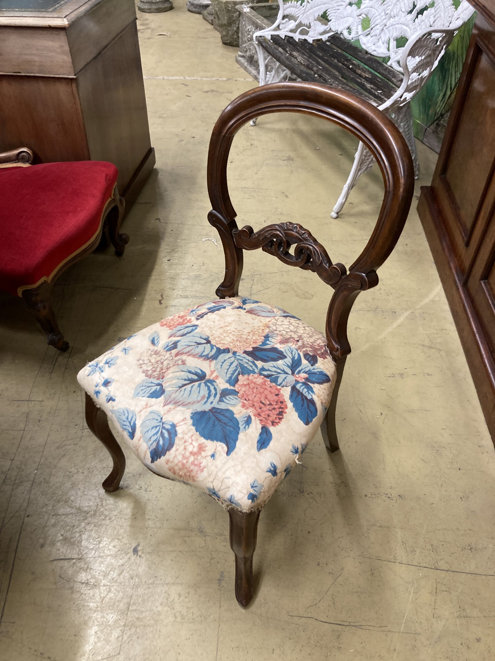 A Victorian oval tripod table, width 68cm, depth 52cm, height 72cm together with four Victorian spoon back dining chairs (three plus one)